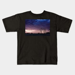 Heavy storm over the meadow Kids T-Shirt